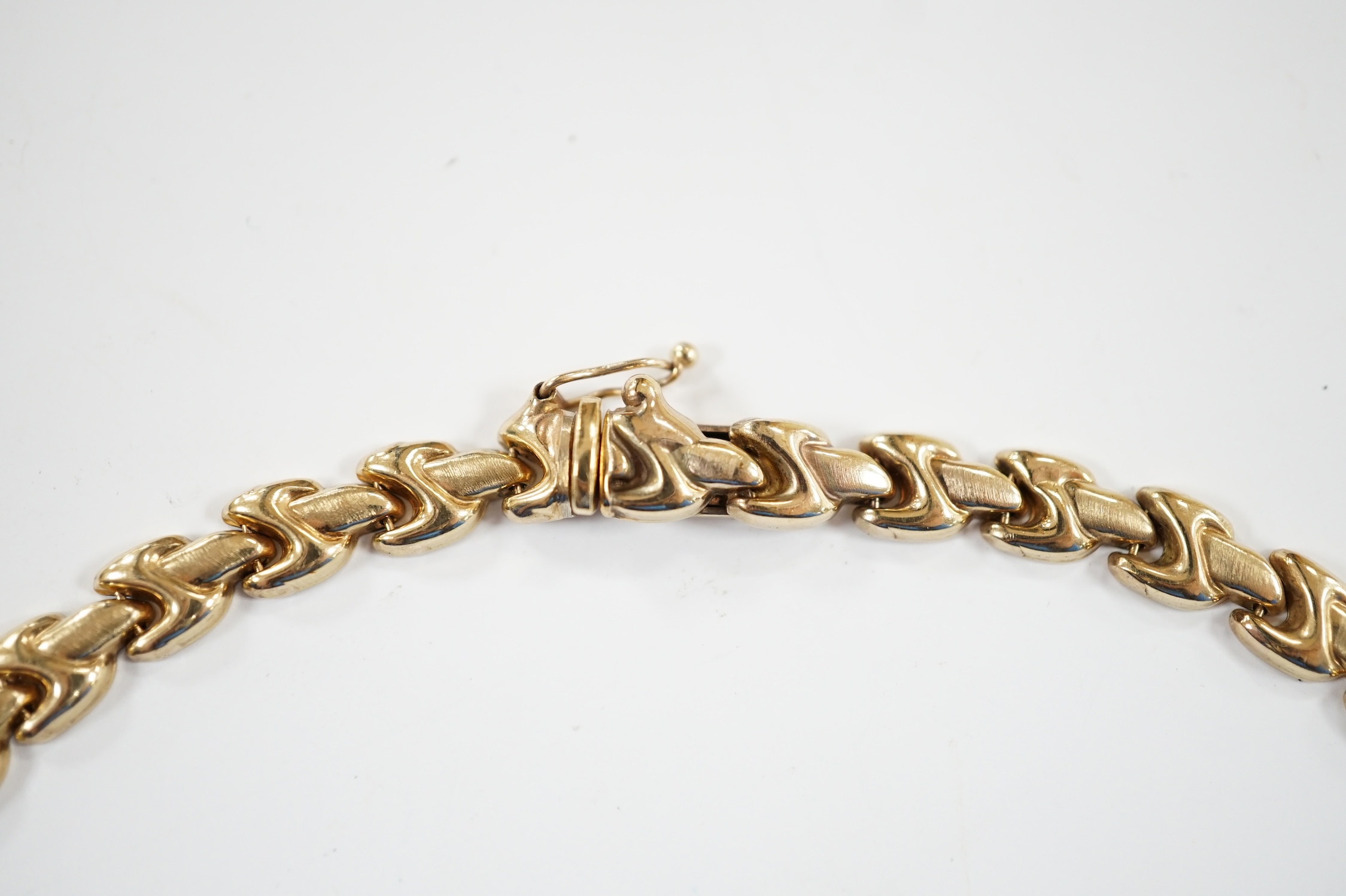 A modern 9ct gold flat link necklace, 34cm, 11.5 grams.
